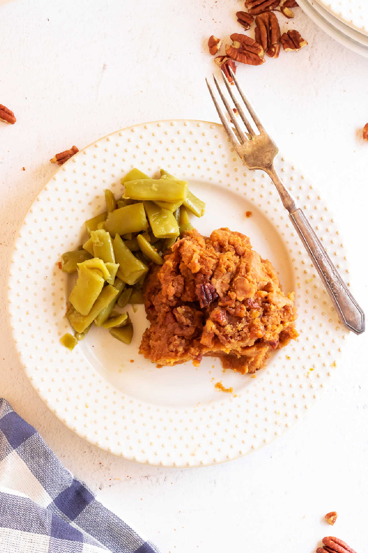 Serving of sweet potato crunch on a white plate.