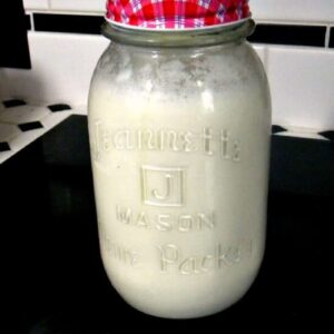 Closeup of a jar of buttermilk.