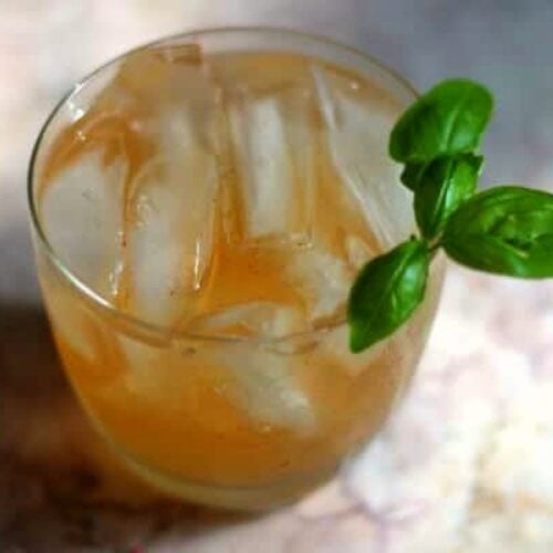 Overhead view of a tequila and ginger ale cocktail.