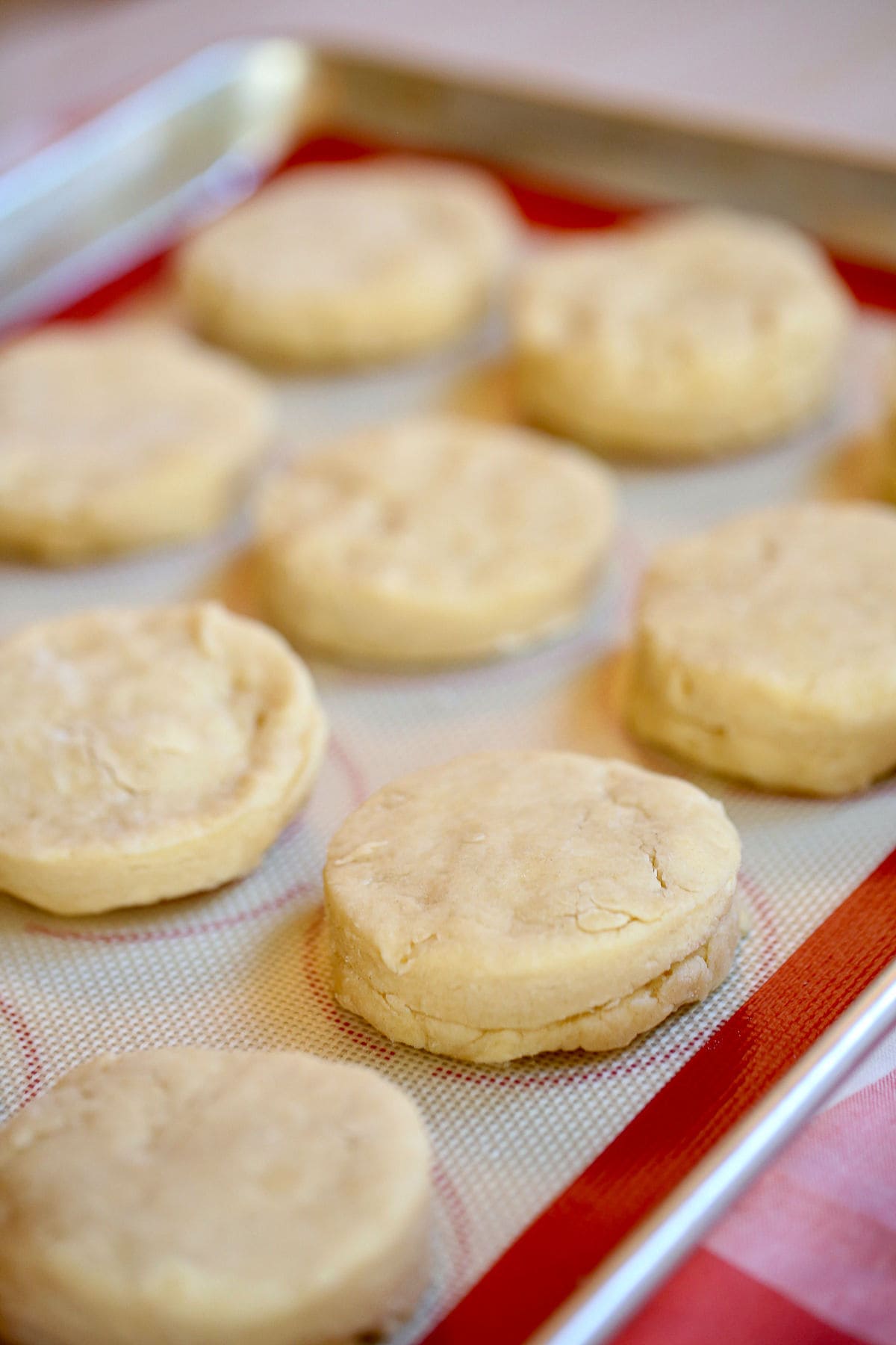 Unbaked scones on a baking sheet.