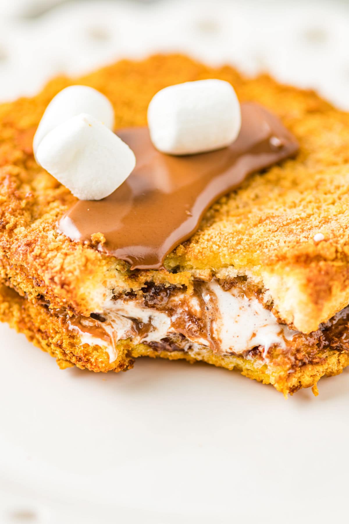 A close up of the air fryer stuffed French toast showing the filling.