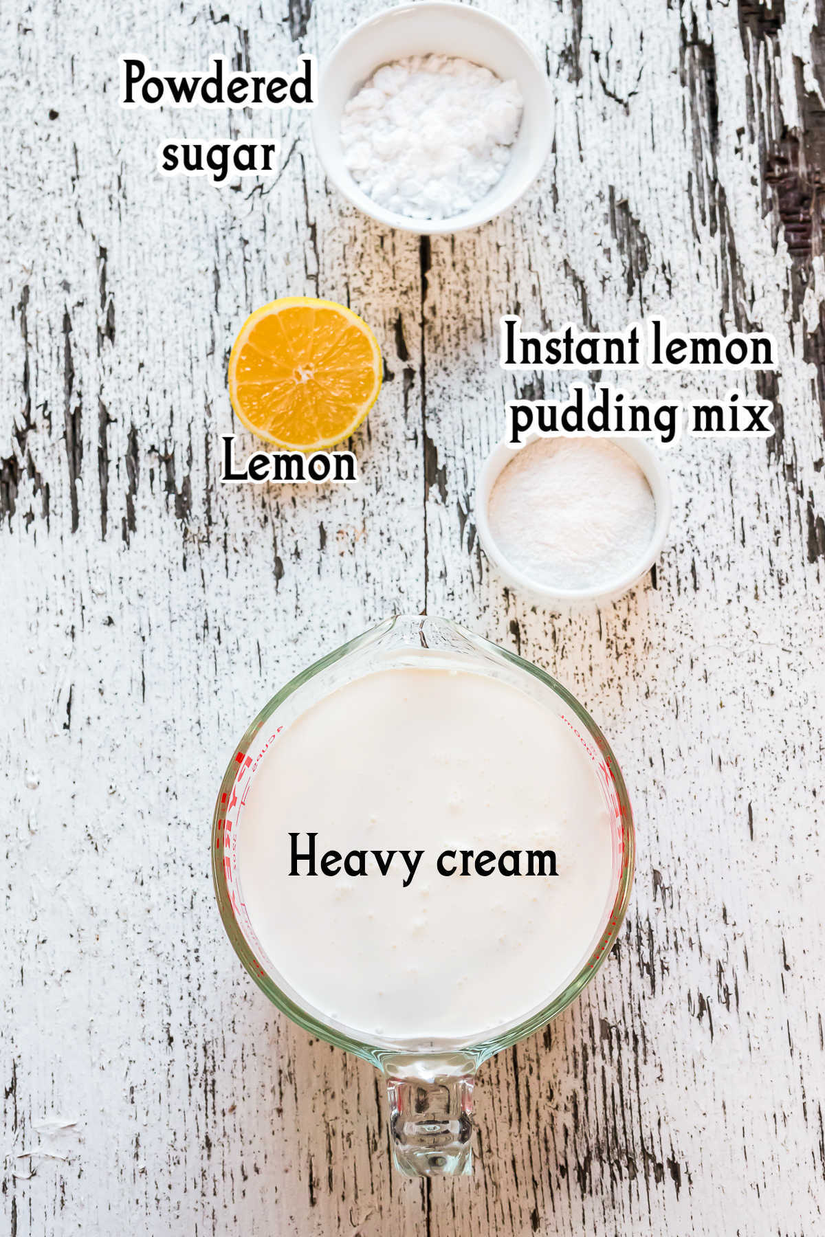 Whipped lemon frosting ingredients with labels.