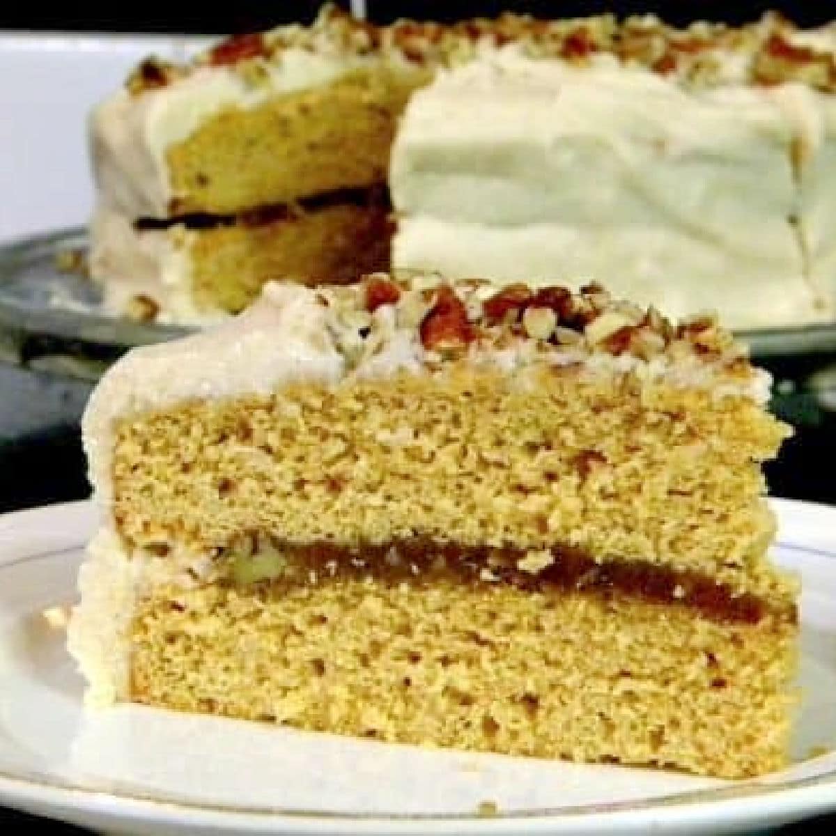 Slice of caramel cake on a plate.