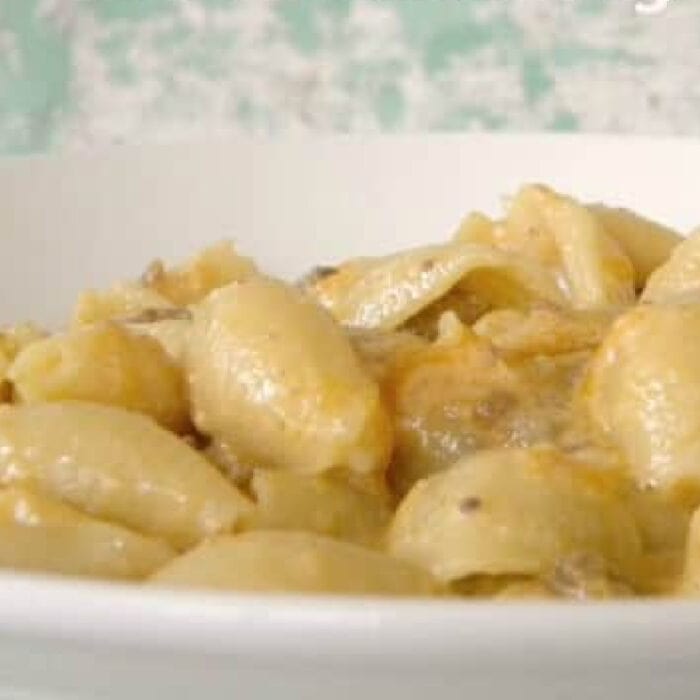 Bowl of pasta and ground beef.