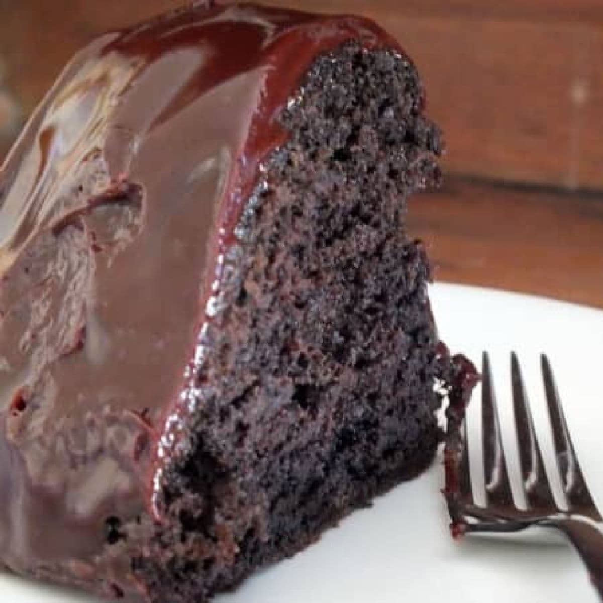 A slice of Guinness Chocolate bundt cake on a plate.