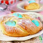 A wreath of Italian Easter bread in the center of the table.
