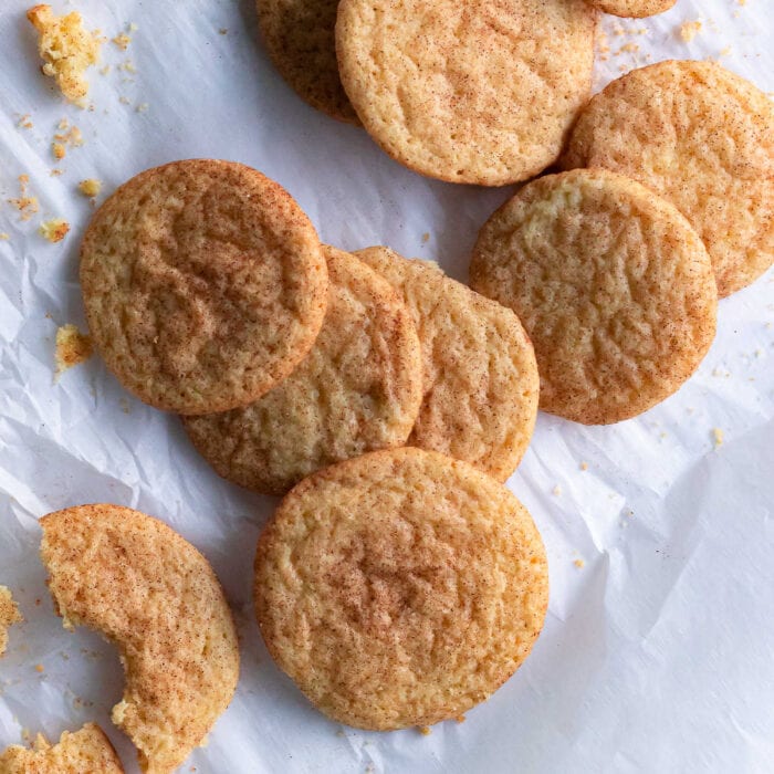 Overhead view of cookies on a piece of parchment.