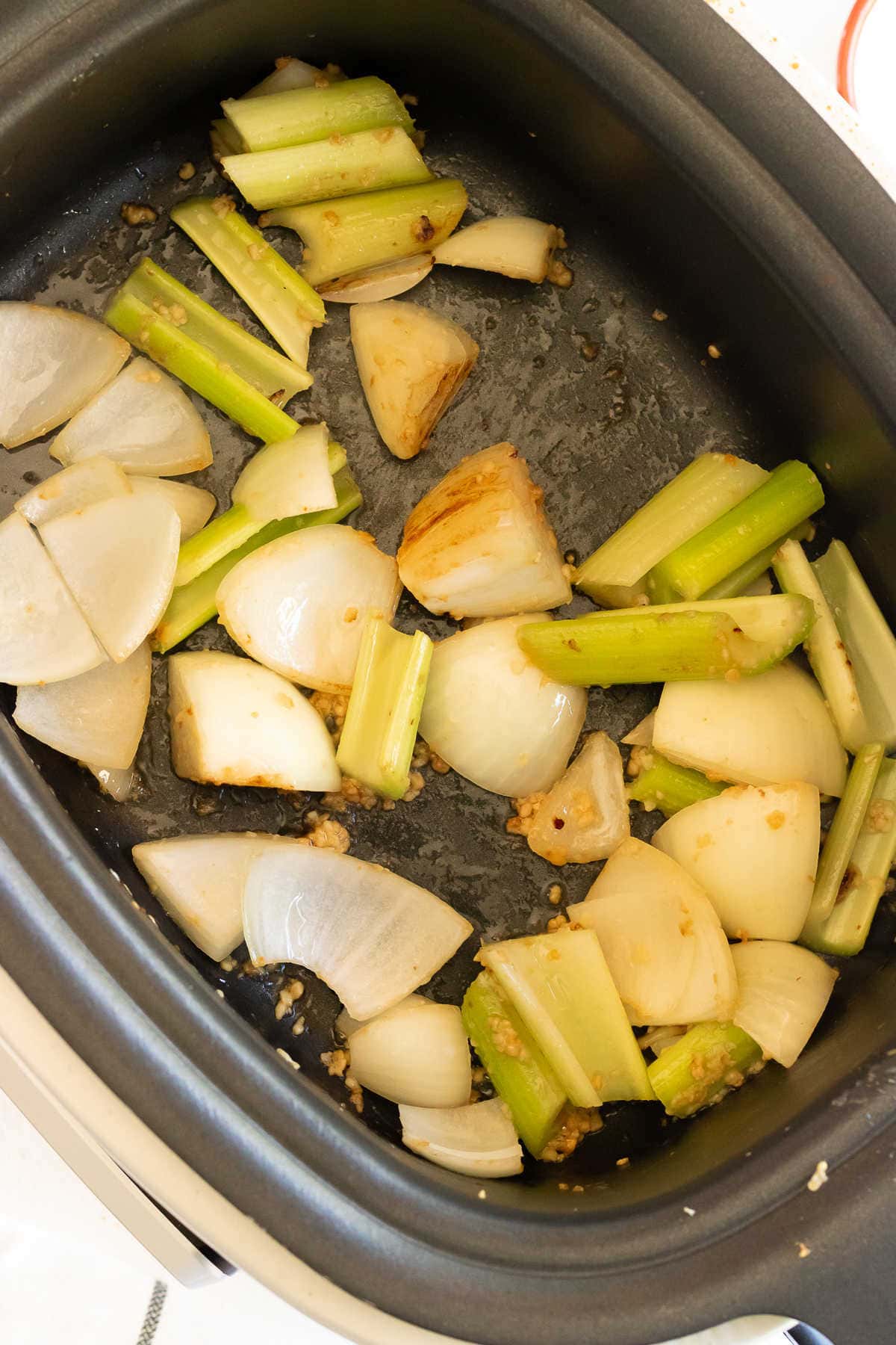 Sauteed onions and celery in the multi-cooker