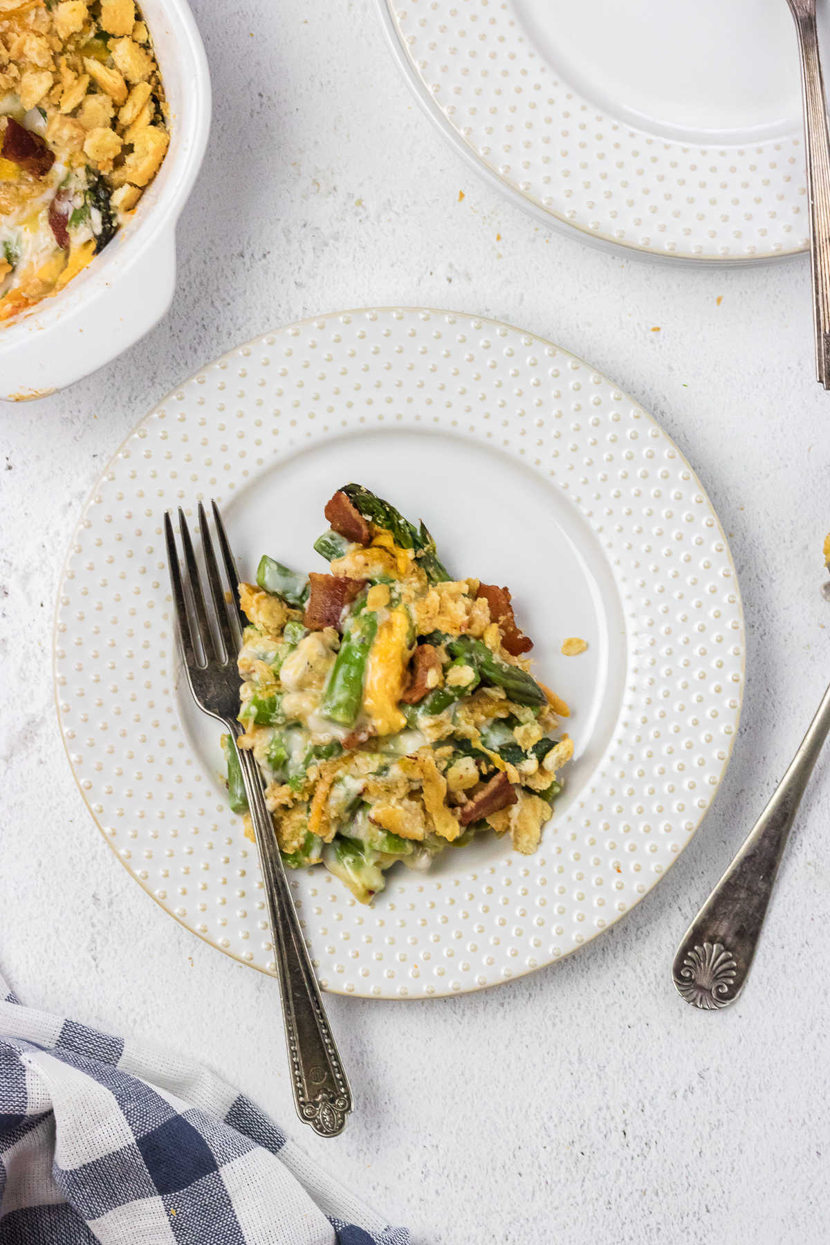 Serving of asparagus casserole on a plate.