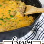 An iron skillet filled with a cheesy casserole. Text overlay for Pinterest.