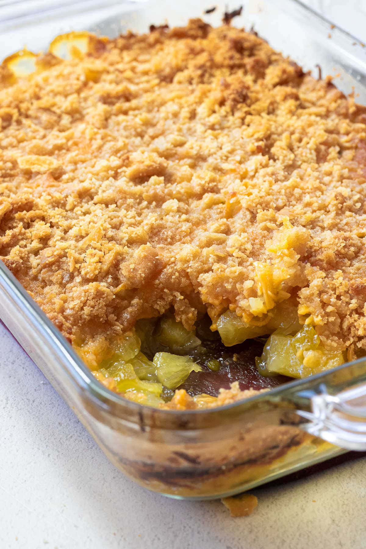 Casserole with a serving removed to show interior.
