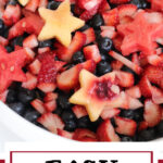 A fruit salad in a bowl with a text overlay for Pinterest.