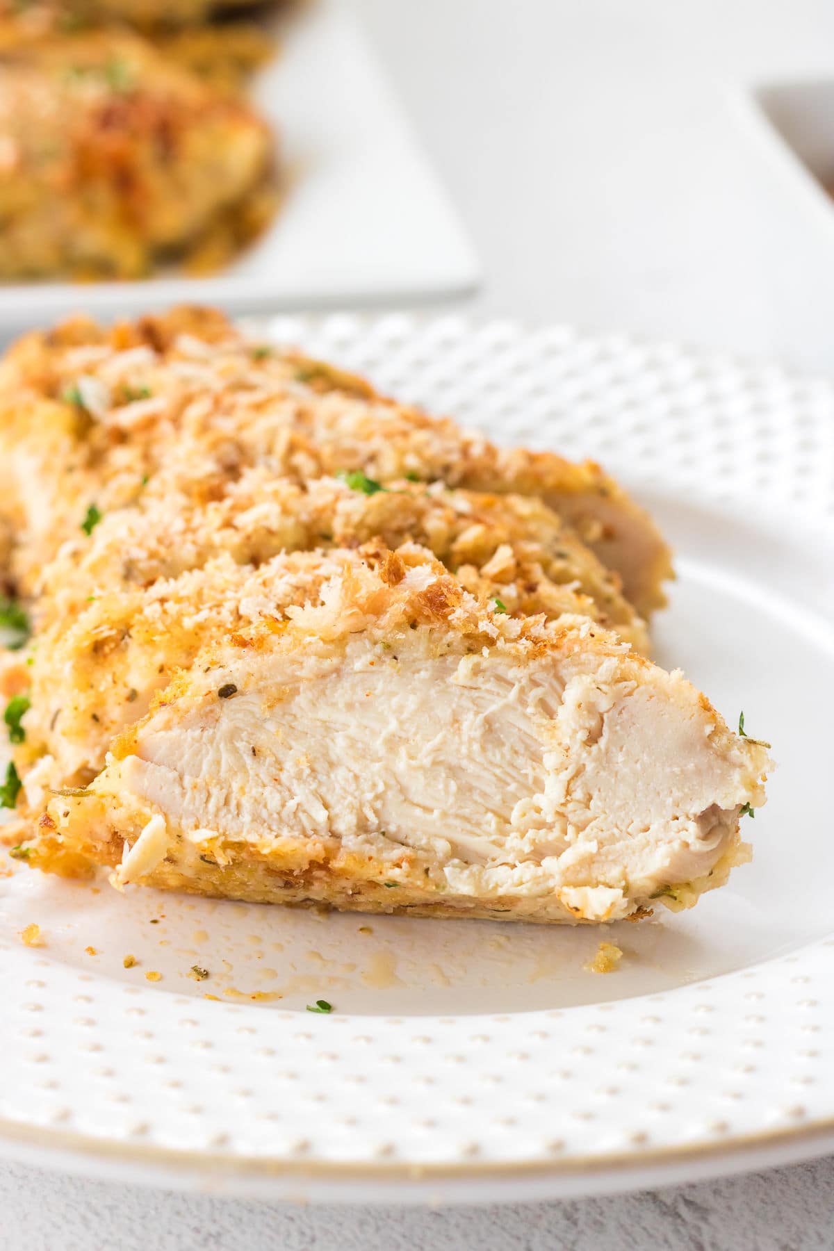 A close up of the finished chicken dish, sliced in bite sized pieces.