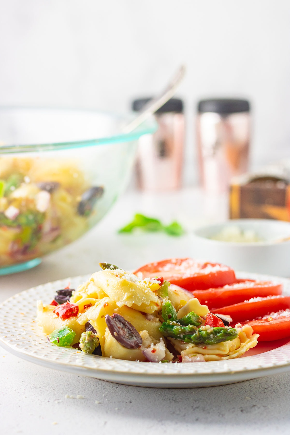 Side view of a plate of the pasta salad ready to be eaten.