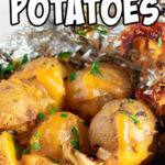 Closeup of finished potatoes in foil with text overlay for Pinterest.