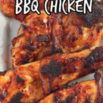 Overhead, closeup view of finished BBQ chicken breast. Text overlay for Pinterest.