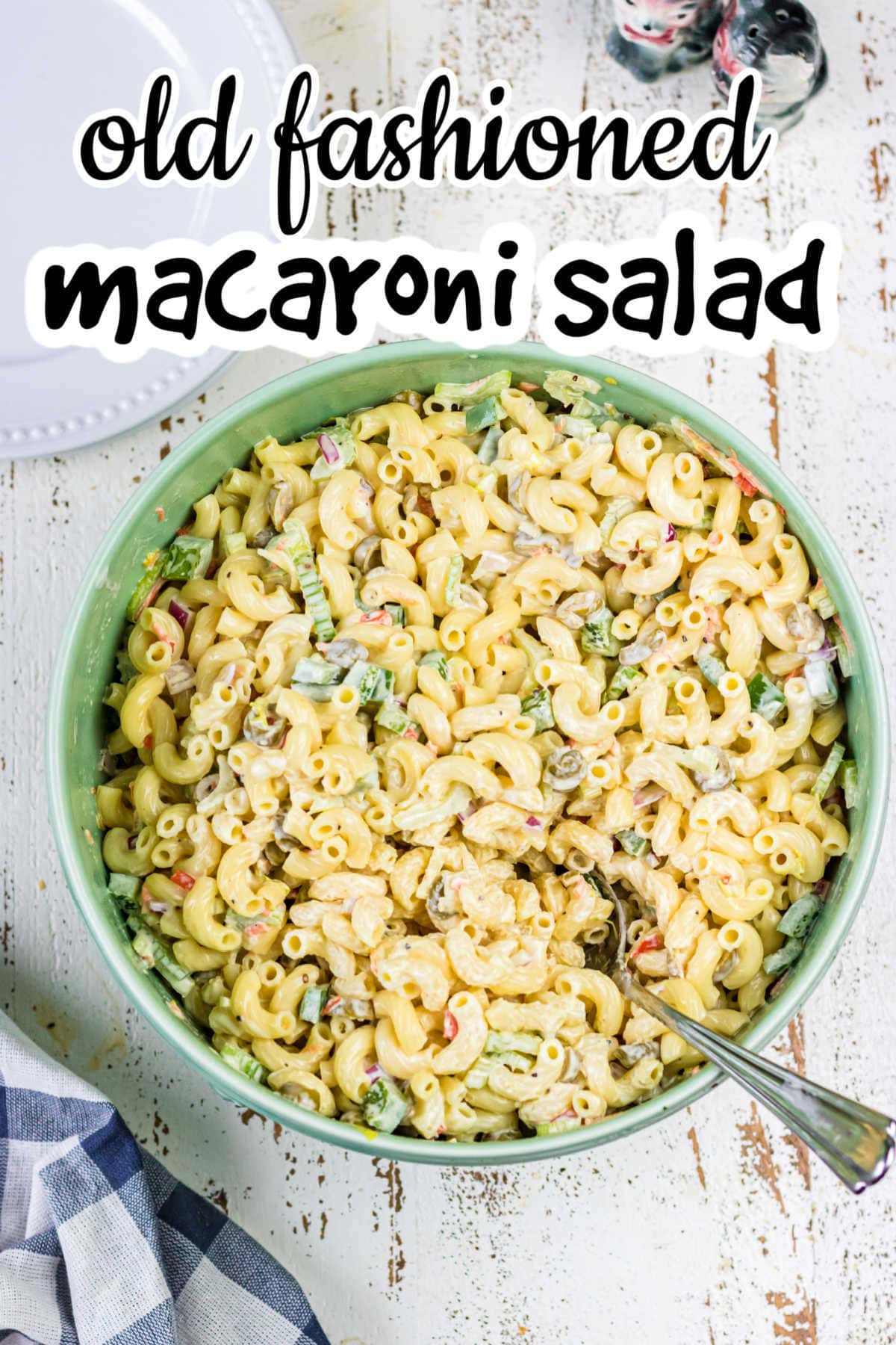 Title image - overhead view of macaroni salad in a green bowl with title text overlay.