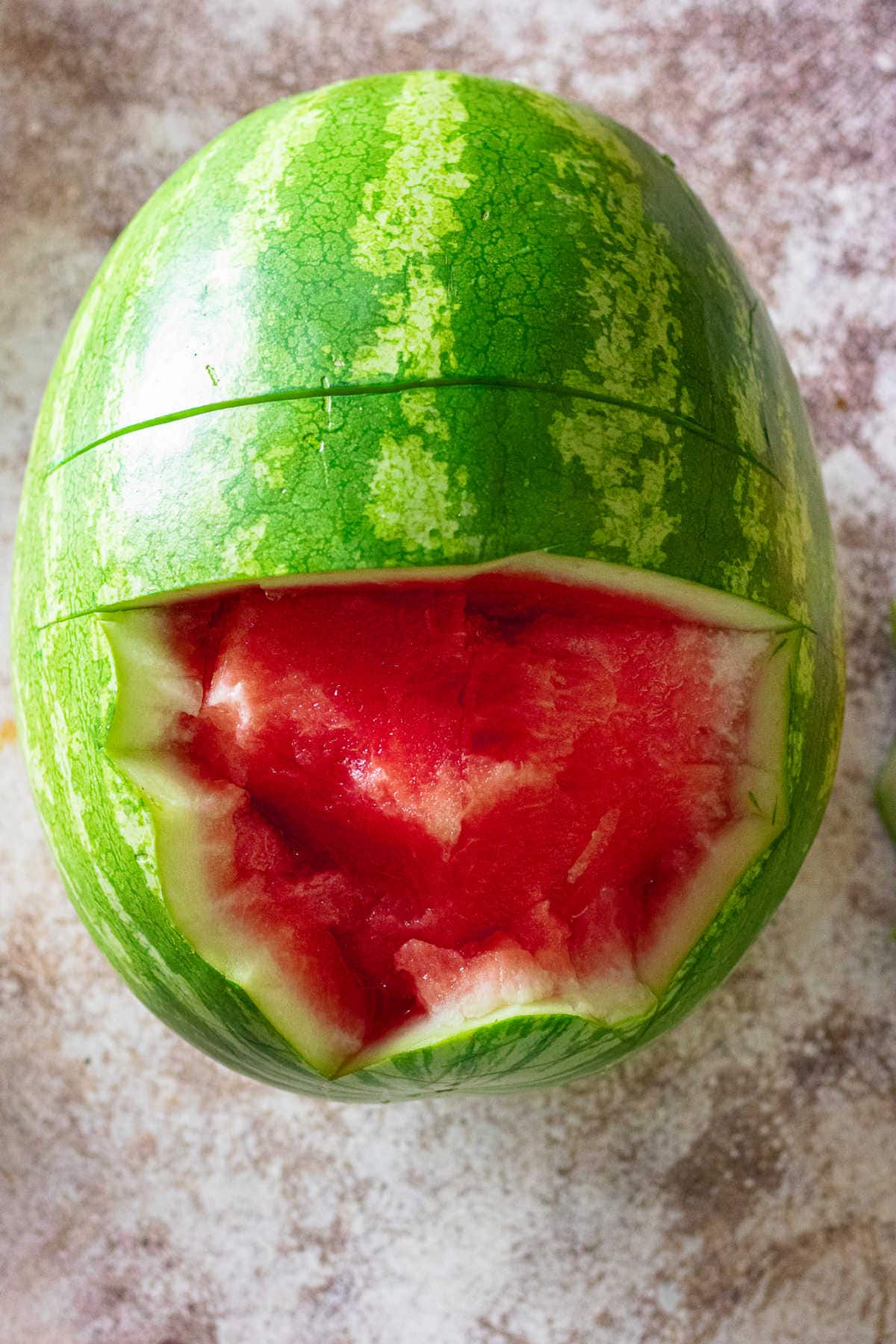 Overhead view of the watermelon basket in process.