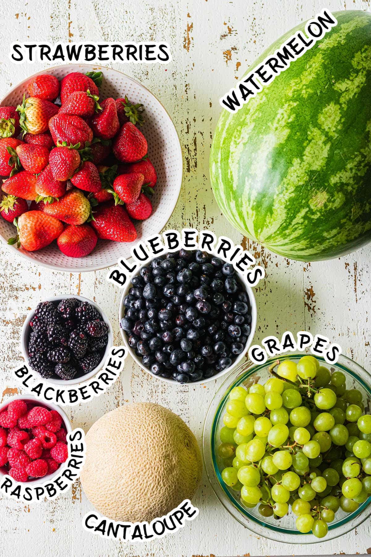 Labeled ingredients for a watermelon basket.