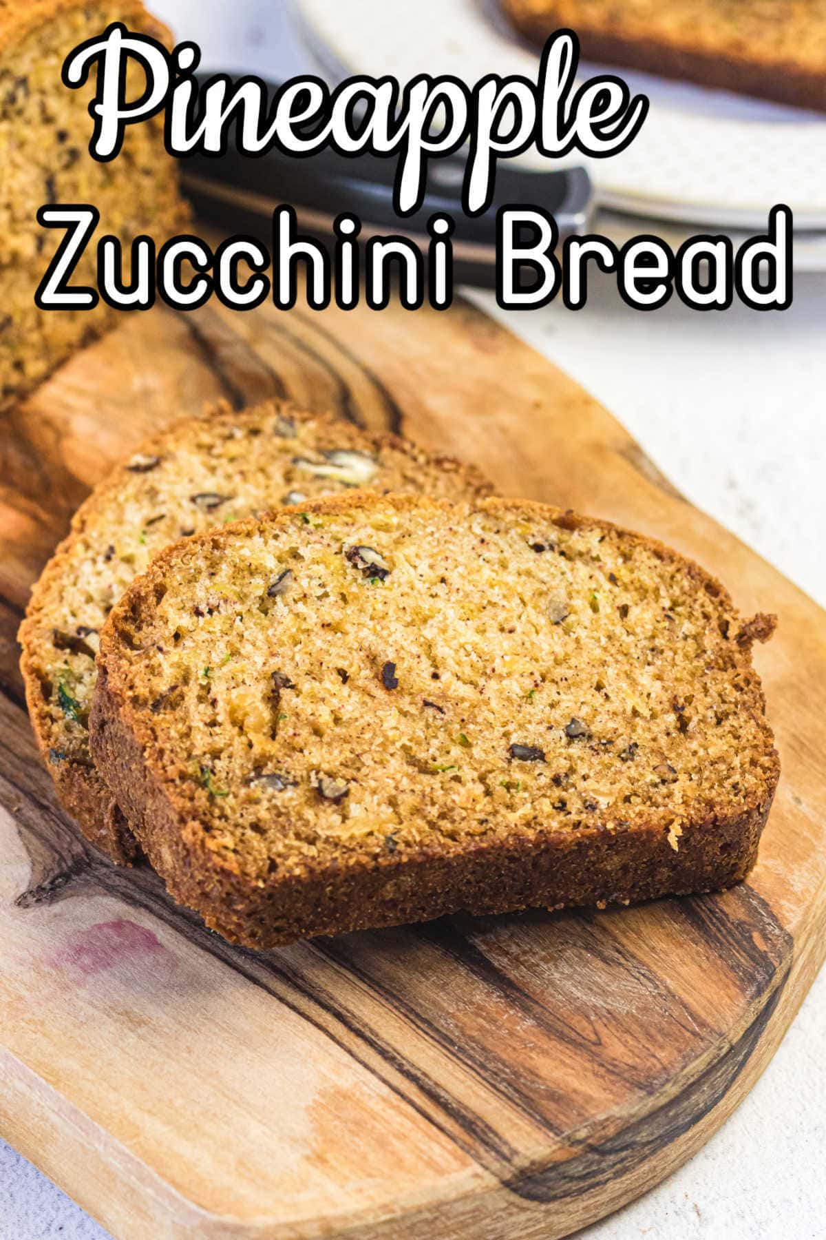 Closeup of the zucchini bread slices showing texture. Title text overlay.