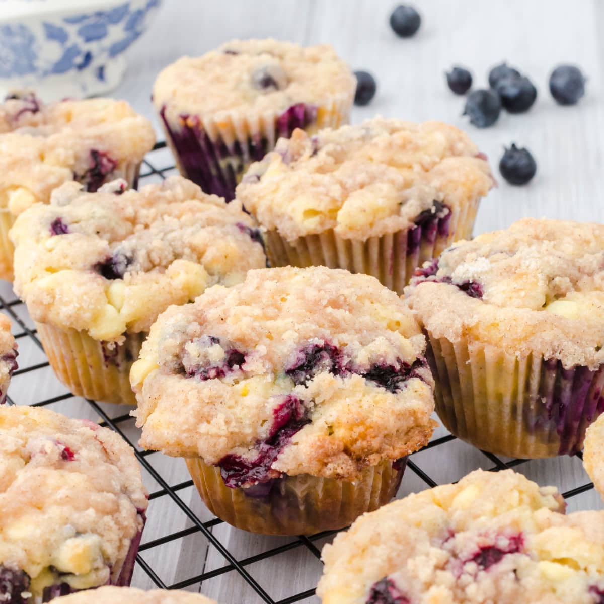 Blueberry muffins on a cooling rack. 