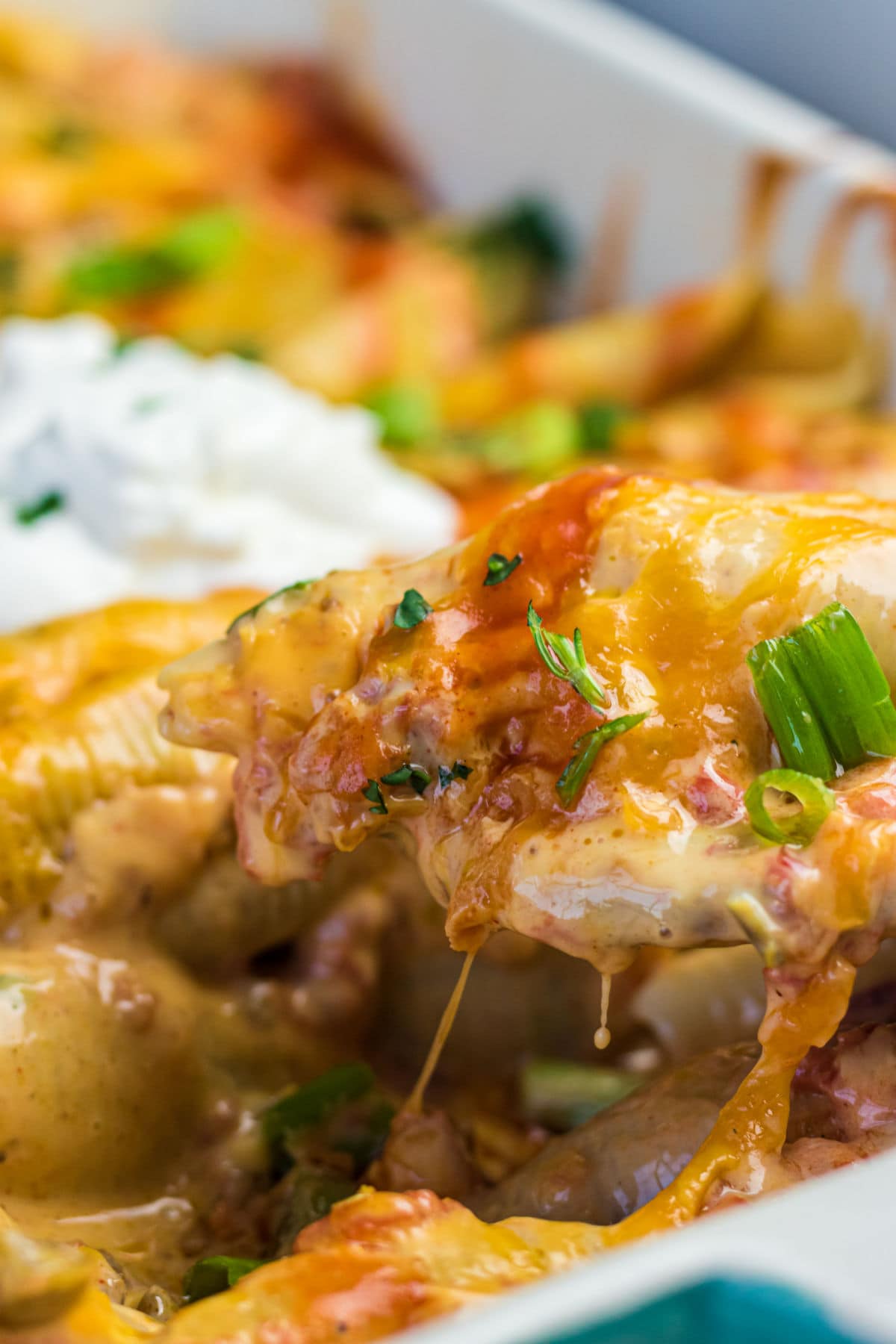 Close up of the casserole showing the gooey cheese.