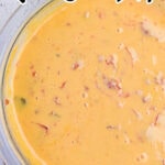 Overhead view of queso in a bowl with text overlay for Pinterest.