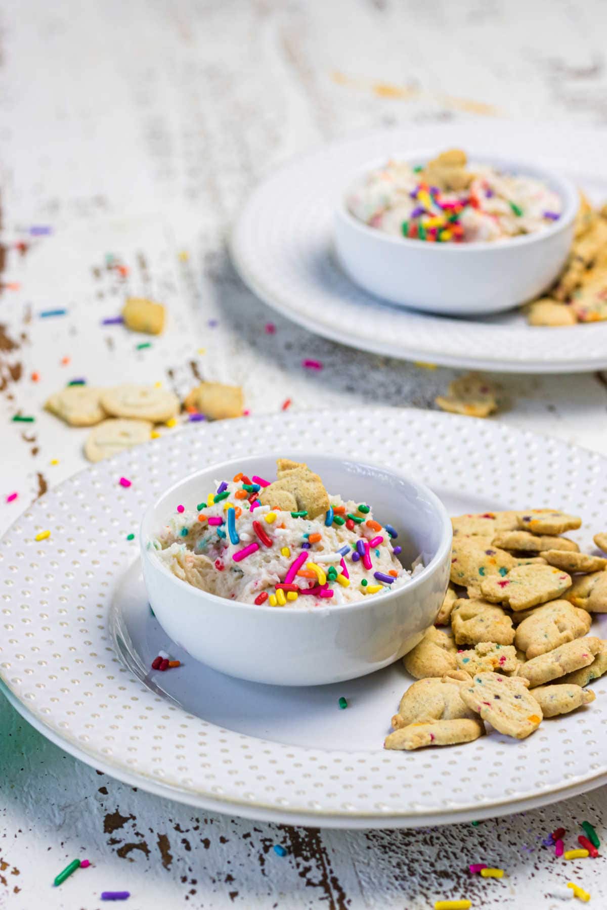 Decorative image - finished dip in small bowls with cookies nearby.