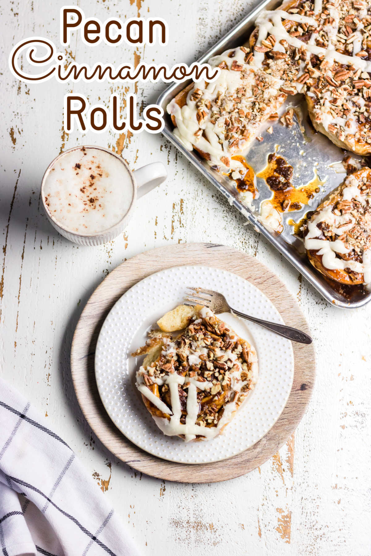 Pecan roll on a plate with a pan of rolls next to it. Title text overlay.