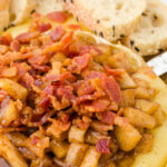 A closeup of the baked brie with apples for pinning to Pineterest.