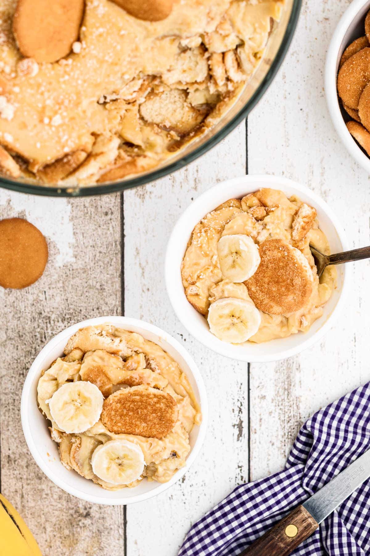 Two servings of banana pudding in bowls on the table.