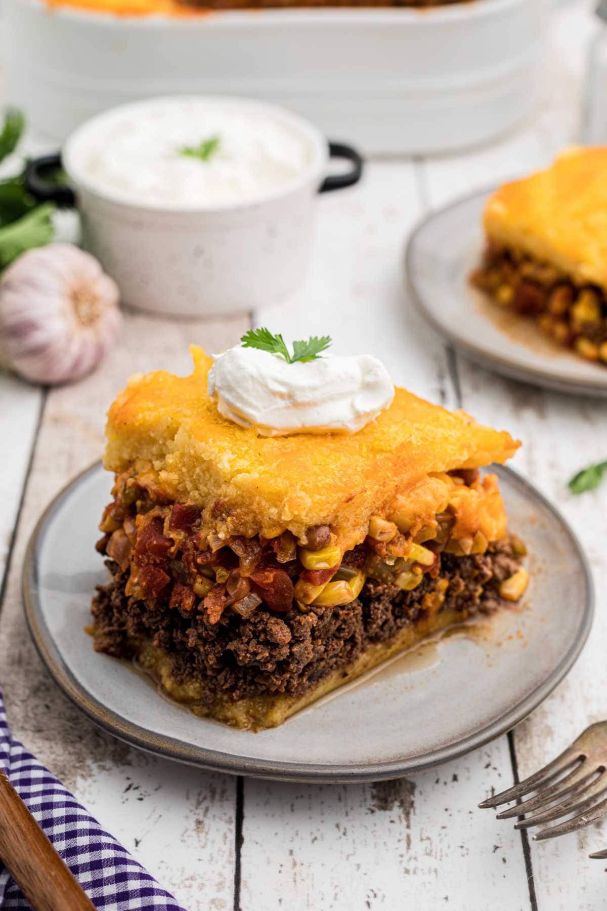 A serving of tamale pie on a plate.