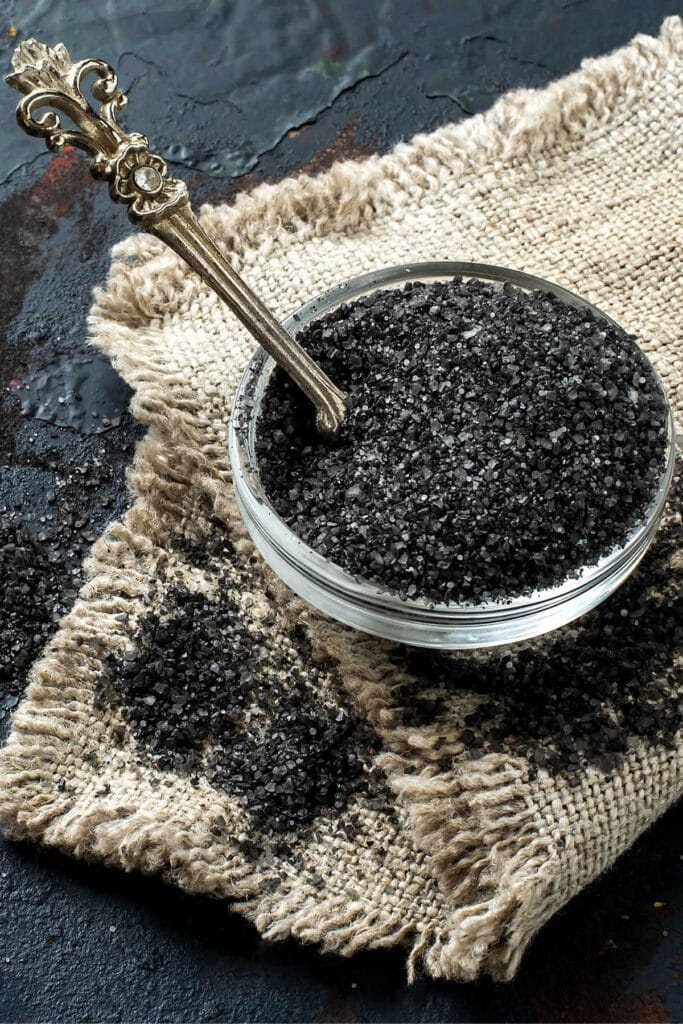 Black salt in a bowl.