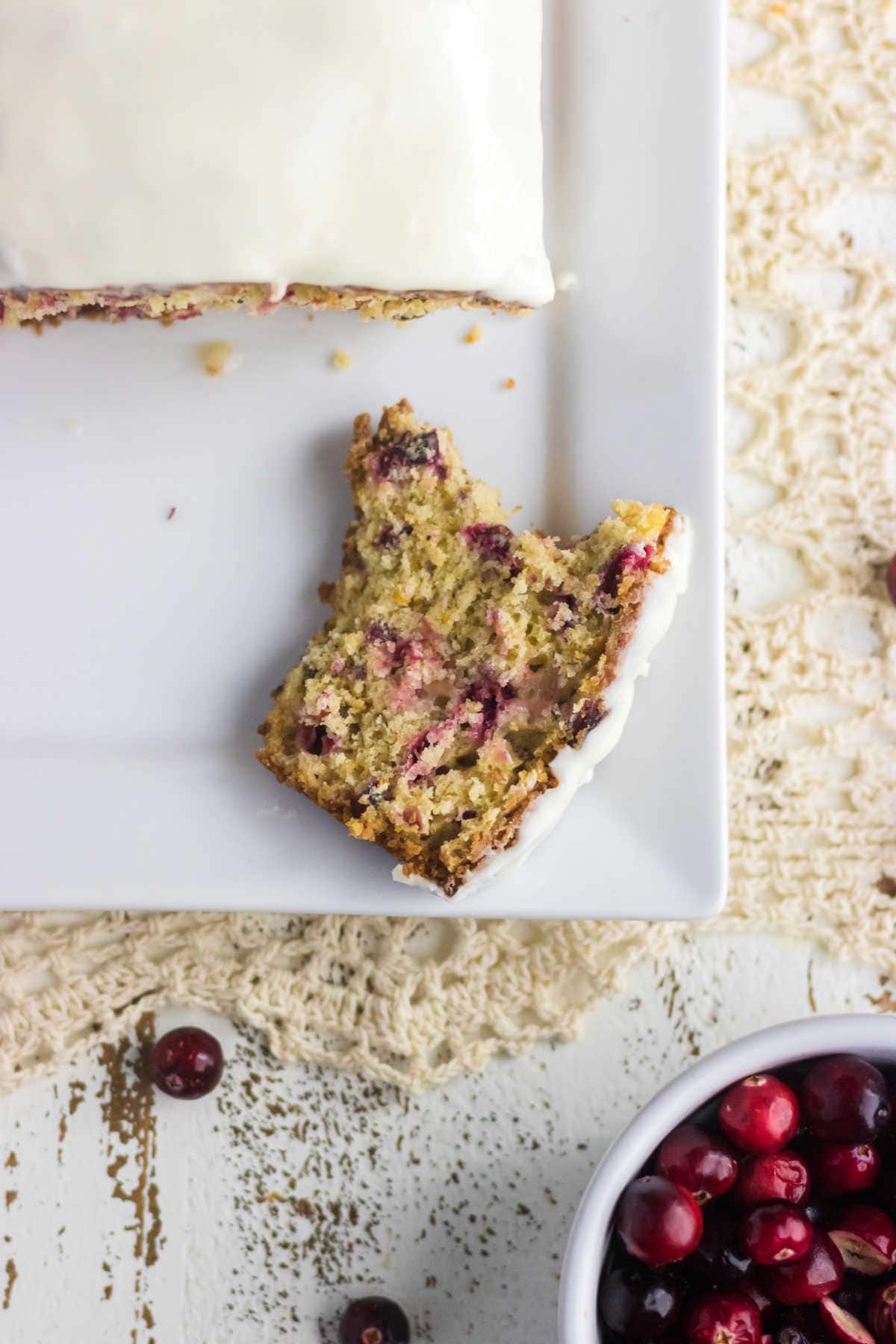 Overhead view of a slice of cranberry bread.