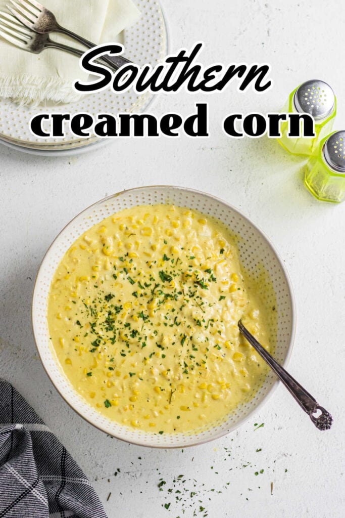 Overhead view of creamed corn in a bowl with title text overlay.