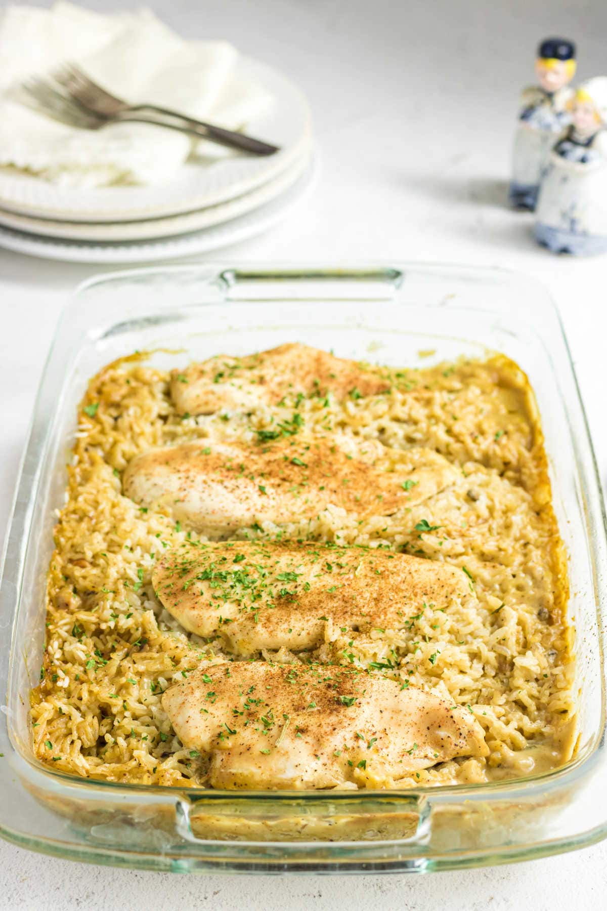 Full casserole dish of chicken and rice.