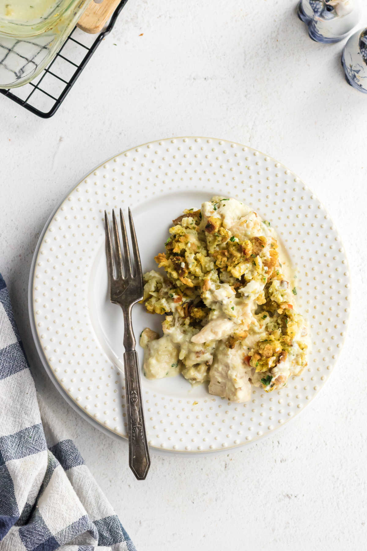 Overhead view of a plate of chicken and stuffing.