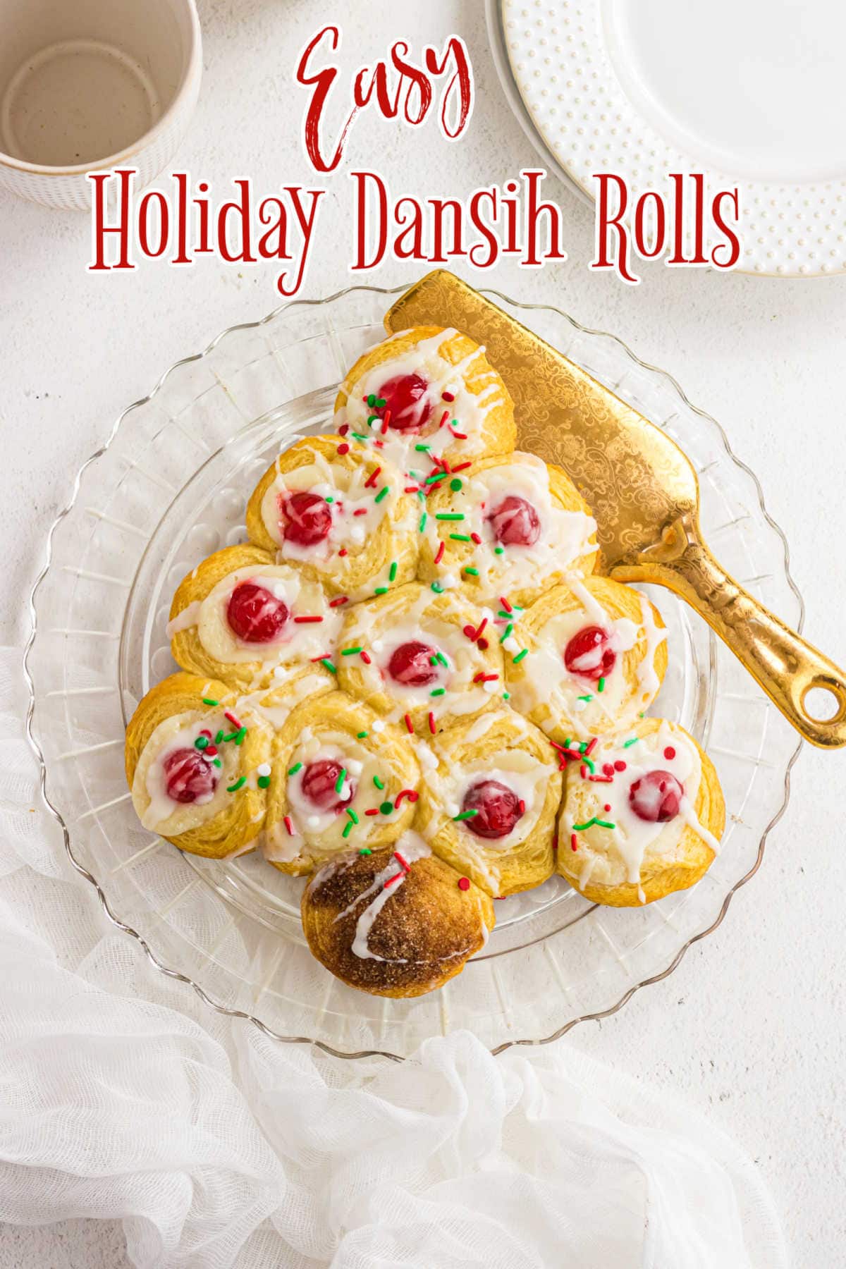 Title image. Overhead view of the sweet rolls formed into a Christmas tree shape.