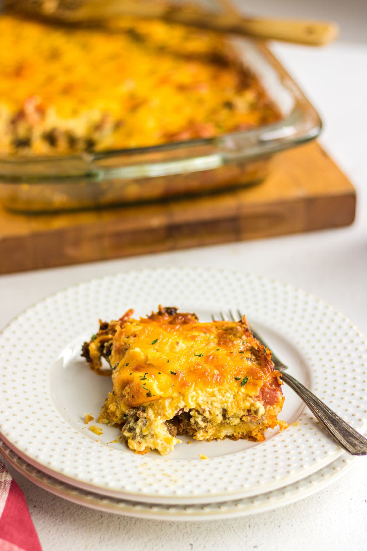 A serving of casserole on a plate.