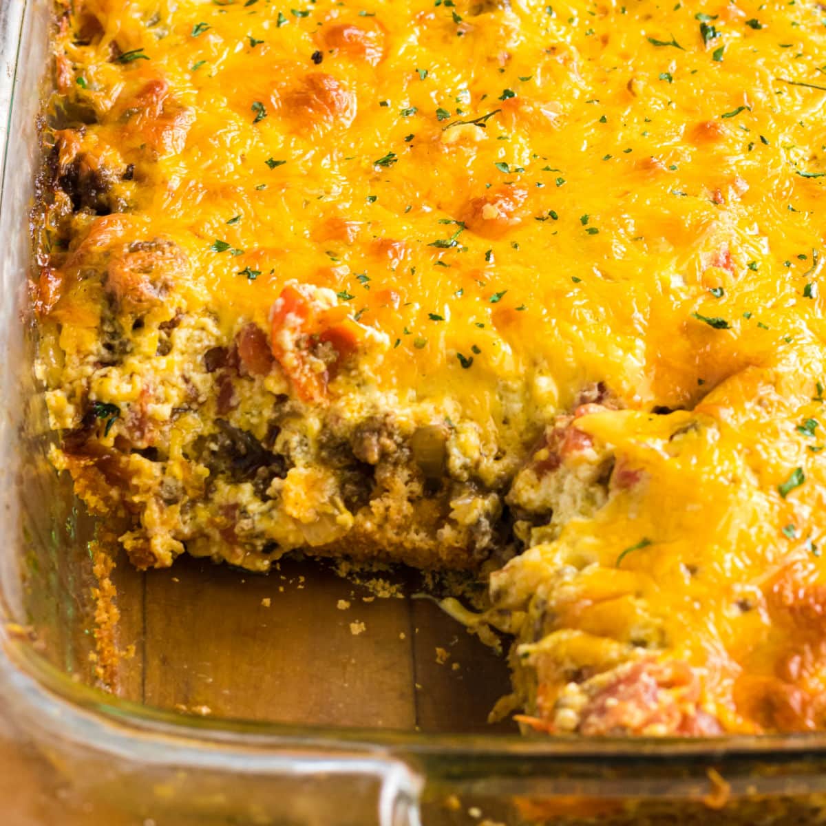 Closeup of the top of the casserole showing all of the cheesy goodness.