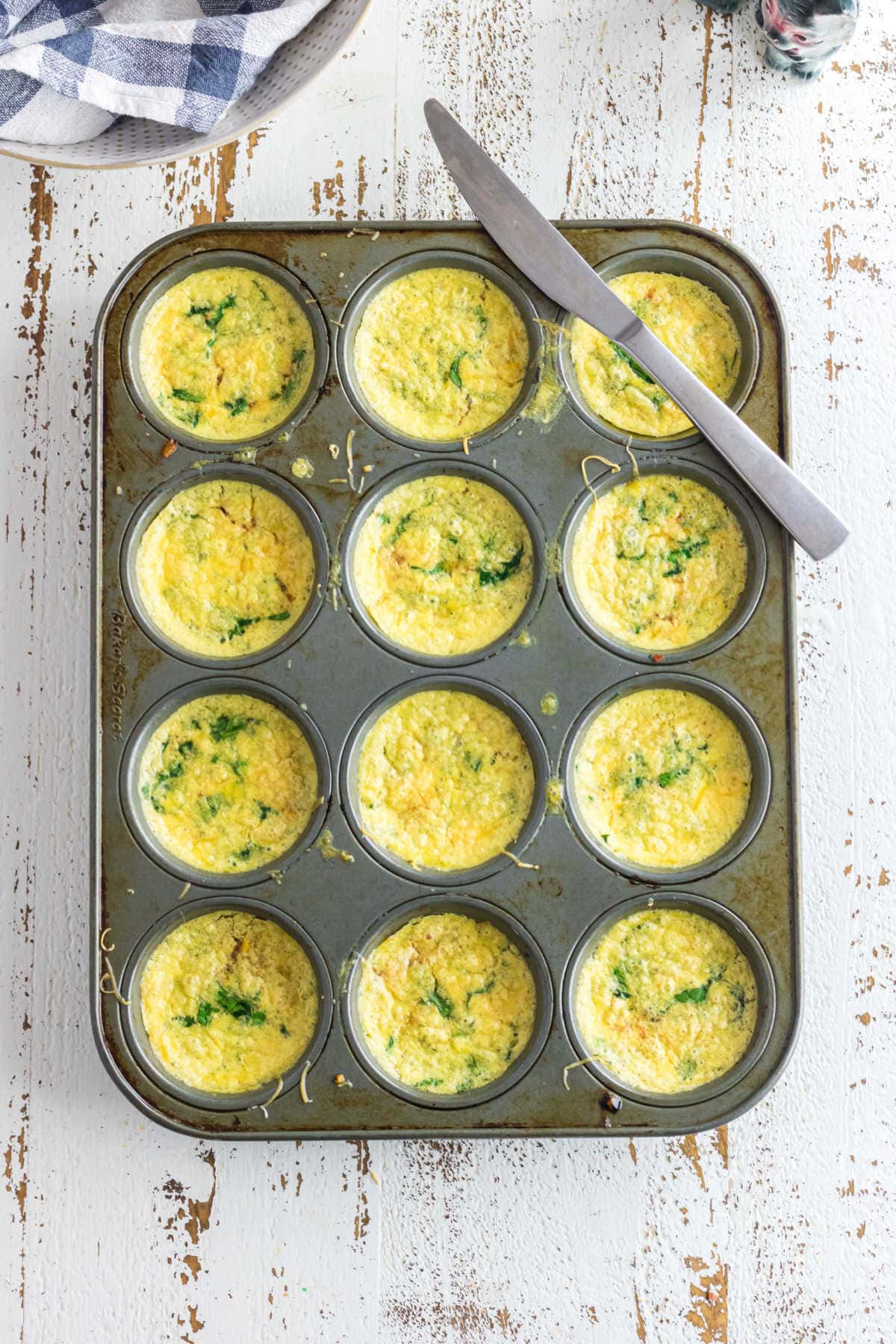 Overhead view of the egg bites in a muffin tin.