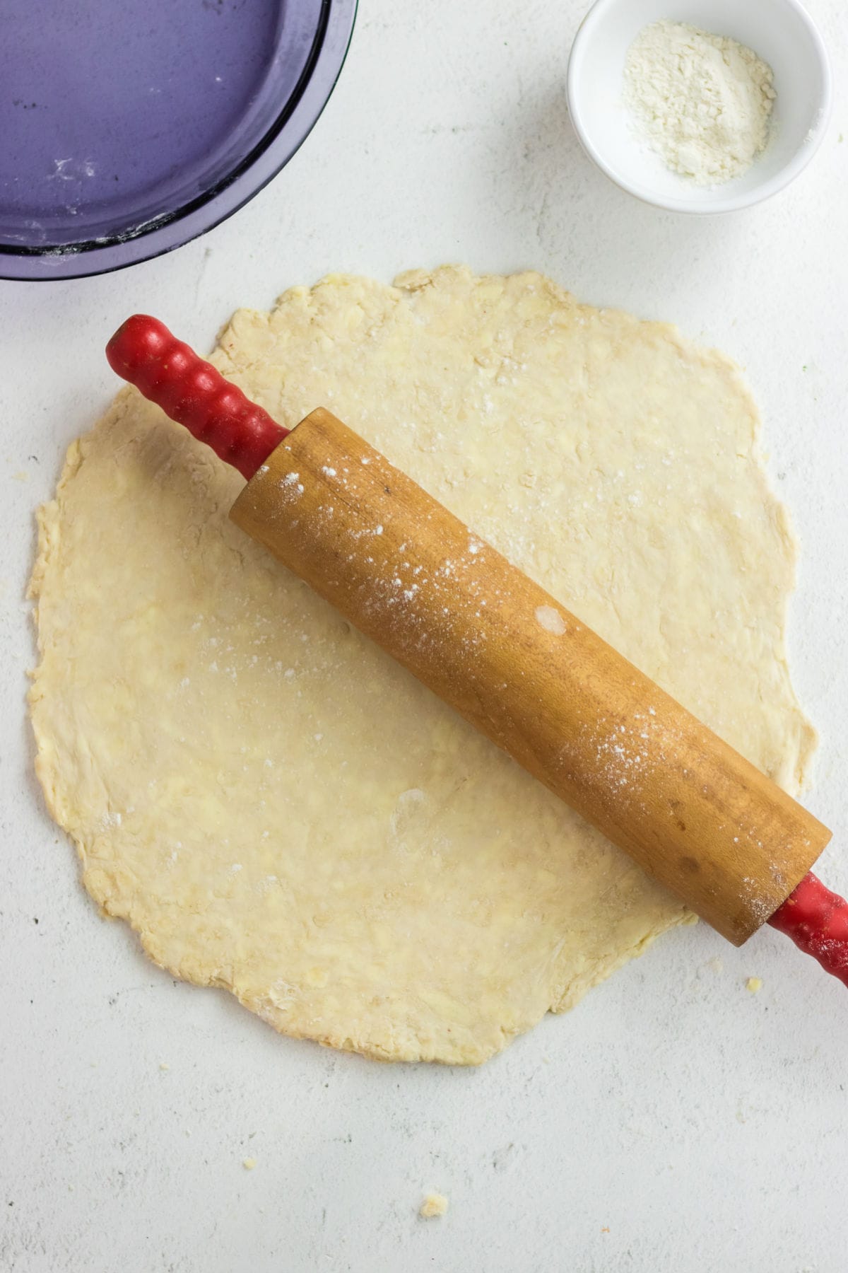 Pie dough being rolled out.