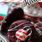 A peppermint kiss cookie on a plate. Text overlay for Pinterest.