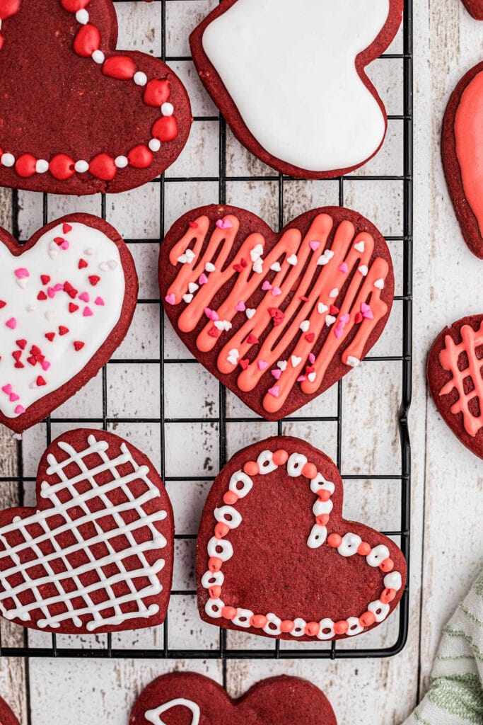 Decorated cookies on a rack.