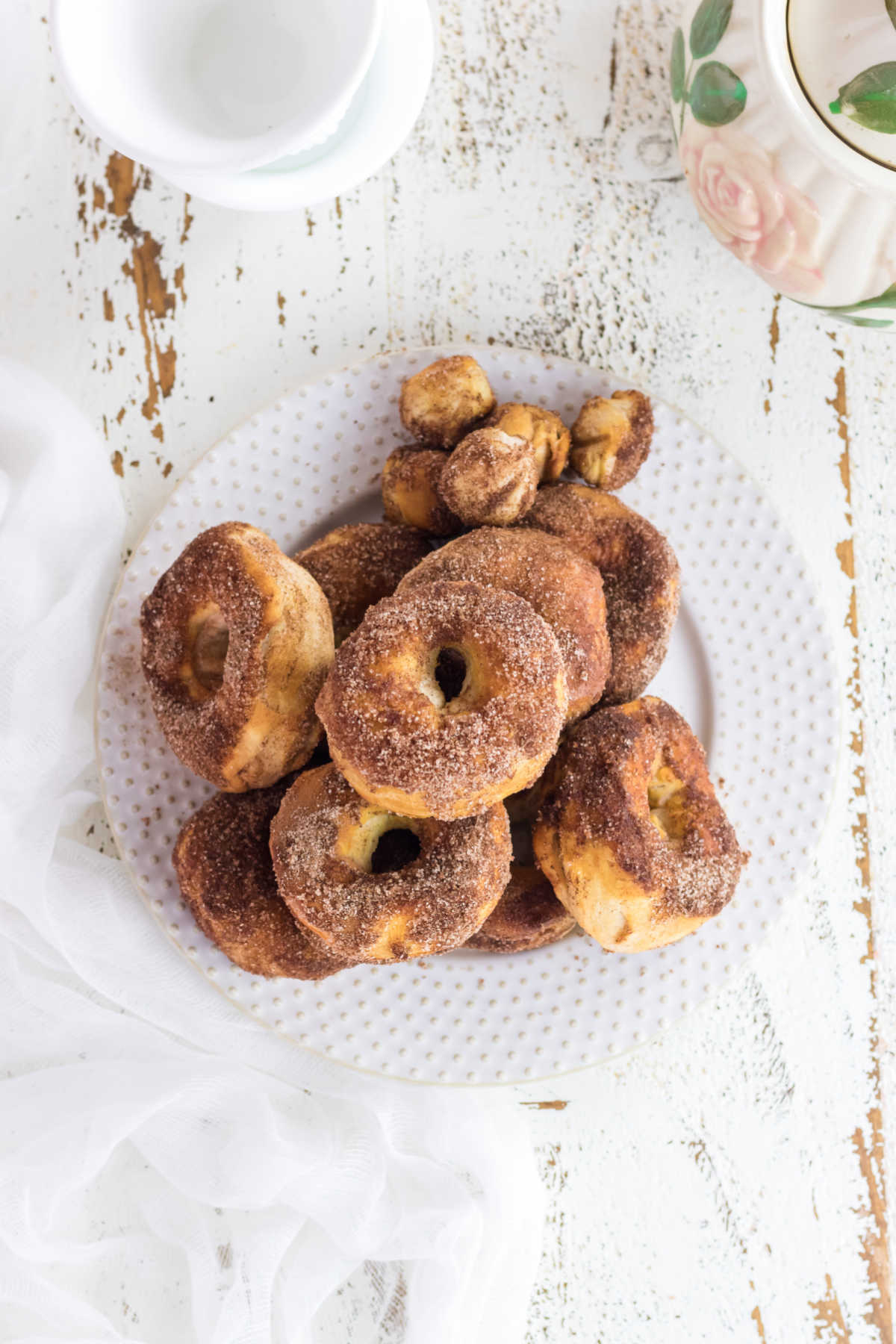 Overhead view of the donuts on a white plate.