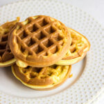 Close up of chaffles on a plate.