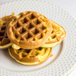 Close up of chaffles on a plate.