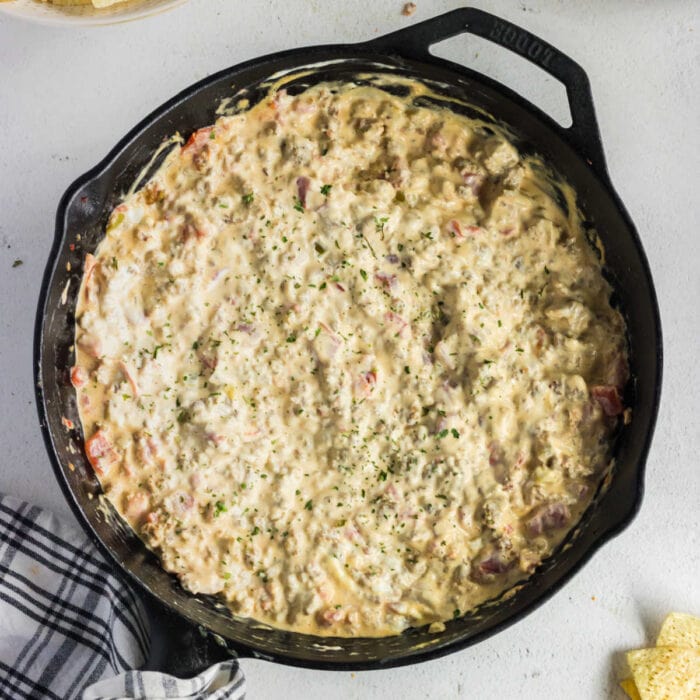 Closeup image of sausage cheese dip.