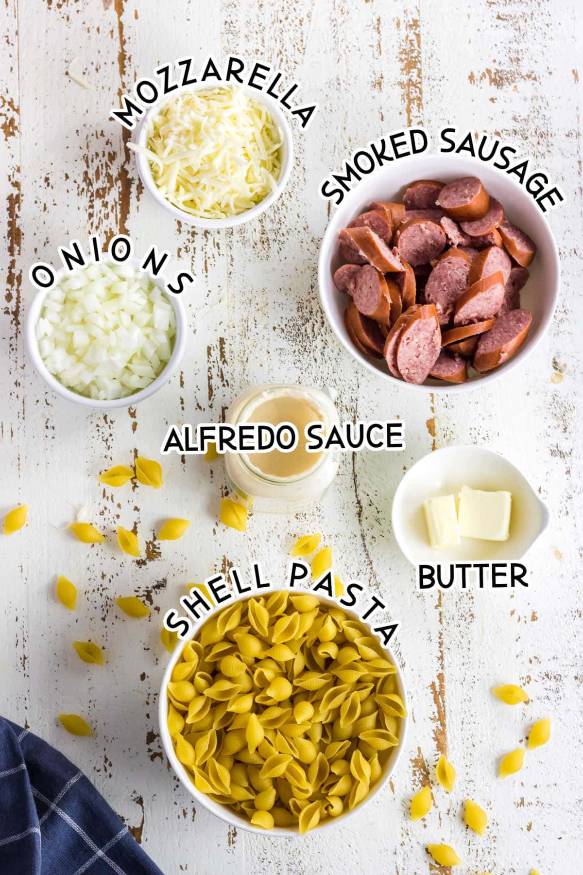 Labeled ingredients for sausage alfredo.