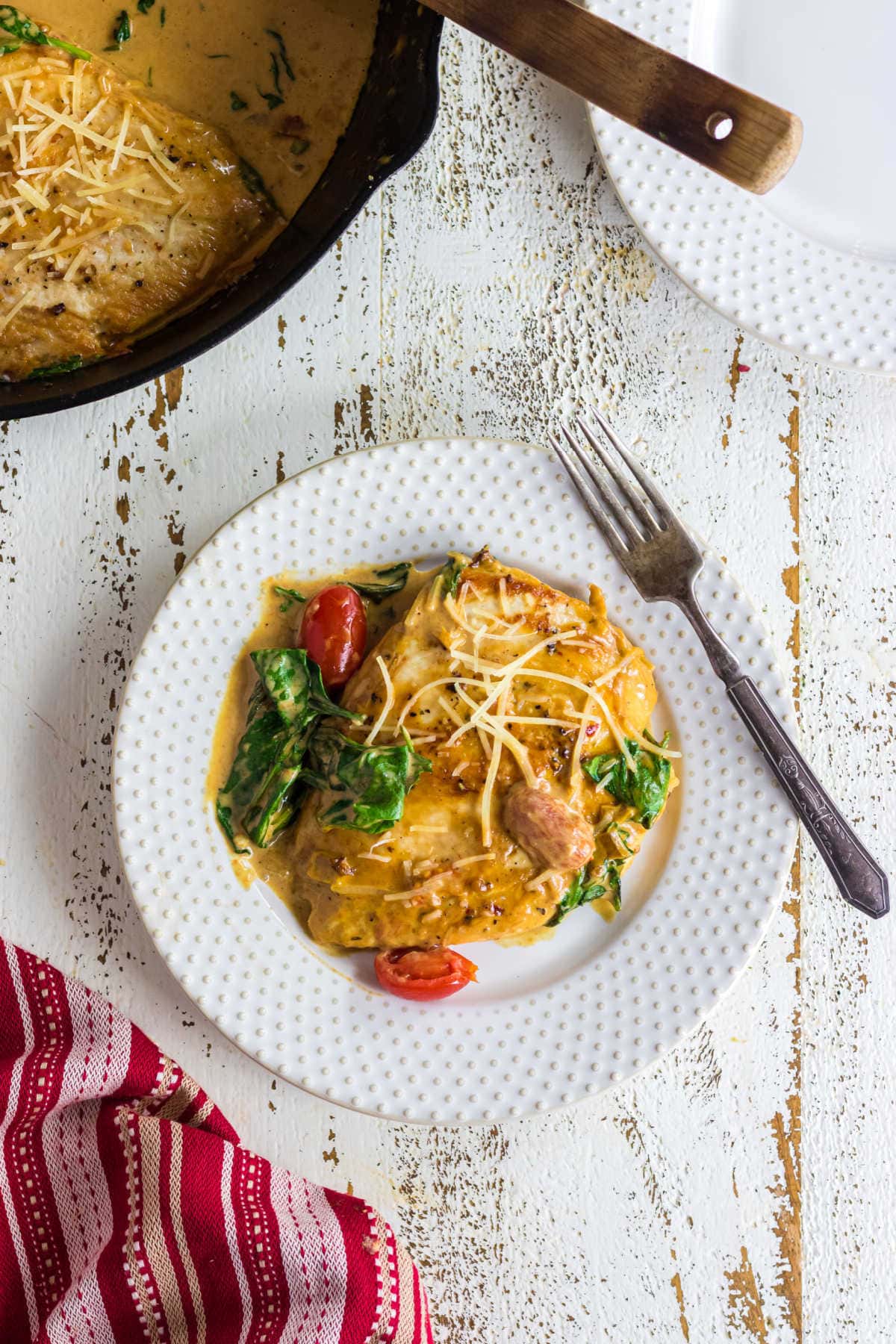 Overhead view of Tuscan chicken on a plate.